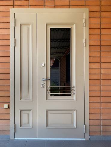 Полуторная металлобагетная дверь